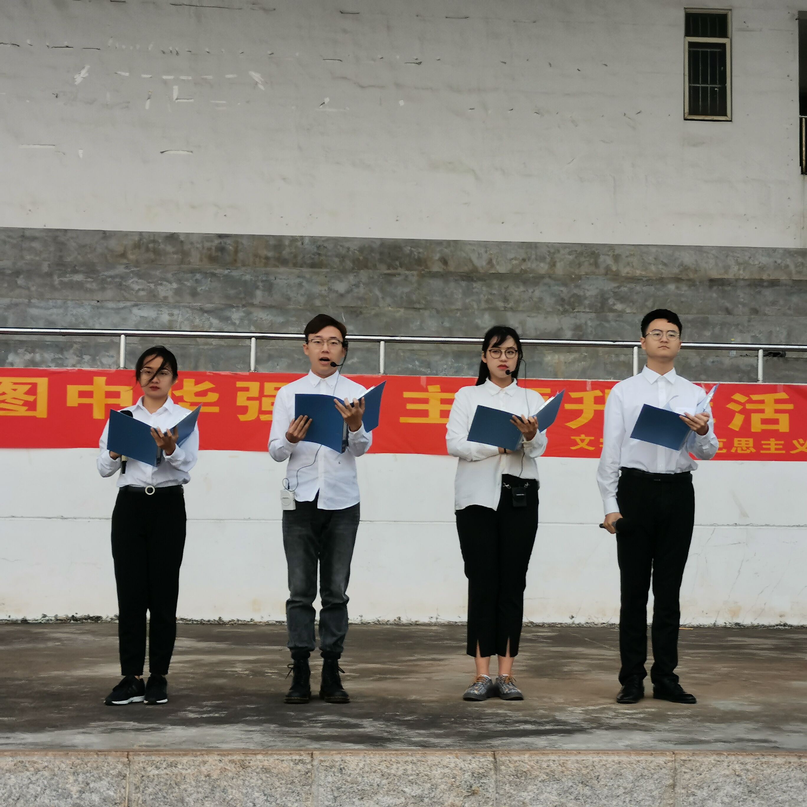 青年之声・勿忘一二九 共筑中国强――记马克思主义学院文学院共同举办主题升旗仪式